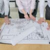 business people looking plans office 100x100